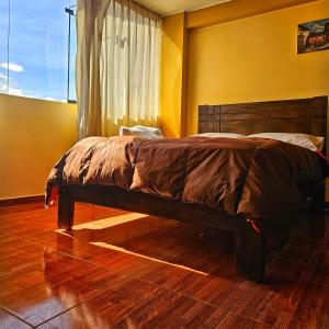 Postelja oz. postelje v sobi nastanitve Pachamama Hostel