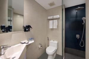 Koupelna v ubytování Four Star by Trans Hotel