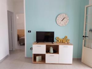 TV a/nebo společenská místnost v ubytování Casa Maretta