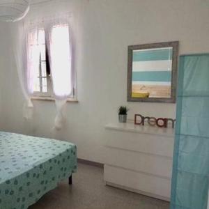 Postel nebo postele na pokoji v ubytování Casa Maretta