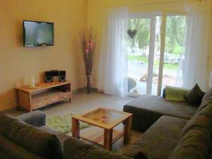 Гостиная зона в Relaxing Holiday Home in Willersdorf in the forest