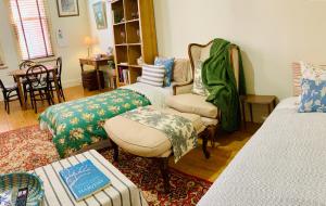 Postel nebo postele na pokoji v ubytování La Rouge Cottage