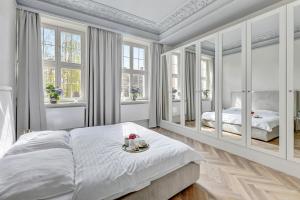 Posteľ alebo postele v izbe v ubytovaní Apartamenty Gdańsk Piwna
