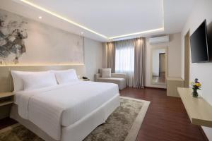 TV a/nebo společenská místnost v ubytování Four Star by Trans Hotel