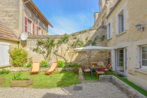 Taman di luar Villa Chausey - Proche de la plage