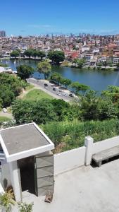 a view of a river and a city at salvador, quartos com ar centro,pelourinho in Salvador