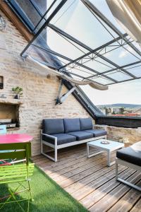 Χώρος καθιστικού στο Triplex de Charme : Terrasse/Vue Panoramique