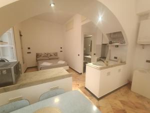 Kuchyň nebo kuchyňský kout v ubytování Porta Soprana Lodge