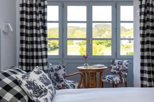 A bed or beds in a room at Casona Las Cinco Calderas