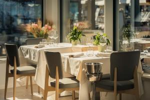 Reštaurácia alebo iné gastronomické zariadenie v ubytovaní Hotel Giardinetto
