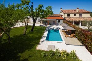 an aerial view of a house with a swimming pool at Garden House Rovinj in Rovinj
