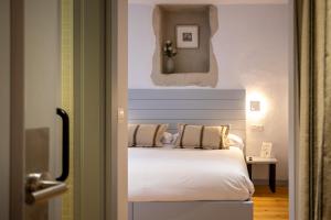 A bed or beds in a room at Casona Las Cinco Calderas