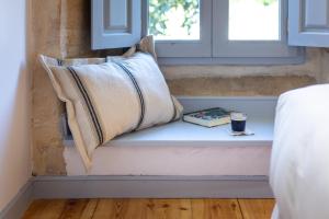 A bed or beds in a room at Casona Las Cinco Calderas