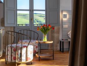A bed or beds in a room at Casona Las Cinco Calderas