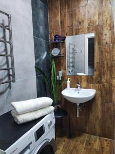 Bathroom sa Апартаменти в центрі Хмельницького (біля ТРЦ ЛибідьПлаза)