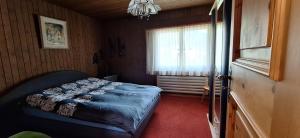 Postel nebo postele na pokoji v ubytování Mansarda Sant'Antonio