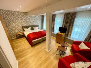 Ένα ή περισσότερα κρεβάτια σε δωμάτιο στο Hotel Am Schloss *** Superior