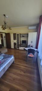Postel nebo postele na pokoji v ubytování Bástya Apartmanház
