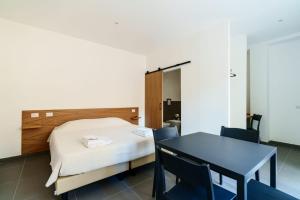 Postel nebo postele na pokoji v ubytování Camere Cavour + 40 fotografií