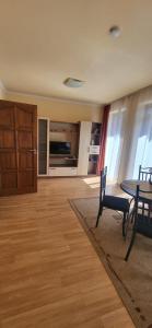 Posezení v ubytování Bástya Apartmanház