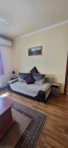 Postel nebo postele na pokoji v ubytování Bástya Apartmanház