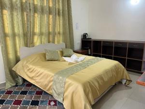 Ένα ή περισσότερα κρεβάτια σε δωμάτιο στο Iamonlang Resort