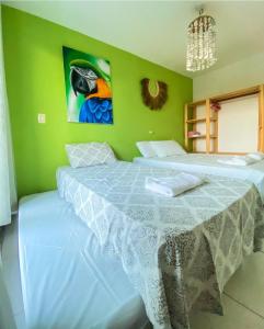 Postel nebo postele na pokoji v ubytování Casa Macao Pipa
