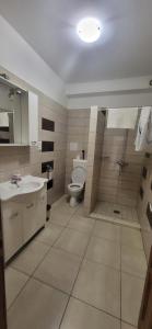 Koupelna v ubytování Bástya Apartmanház