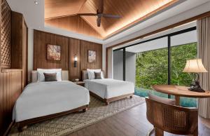 Postel nebo postele na pokoji v ubytování Anantara Ubud Bali Resort + 37 fotografií