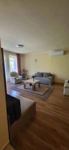 Posezení v ubytování Bástya Apartmanház
