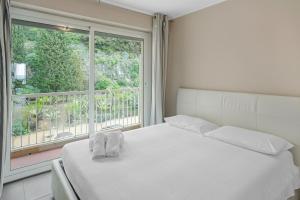 Säng eller sängar i ett rum på Vina del Mare - Happy Rentals
