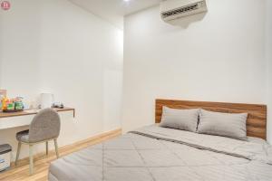 Cama ou camas em um quarto em Tân Hoà Homestay Da Nang