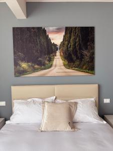 Postel nebo postele na pokoji v ubytování Toscana da aMare