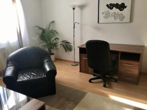 Зона вітальні в Gösser BACHGASSLHOF -- Bed and Breakfast -- Apartments