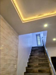 a staircase in a building with a building in the background at PLOT 36 APARTMENT in Lekki