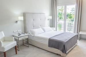 Postel nebo postele na pokoji v ubytování Hotel Atlántico