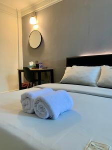 Katil atau katil-katil dalam bilik di Andiana Hotel & Lodge - Kota Bharu City Centre