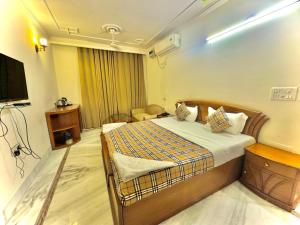 Postel nebo postele na pokoji v ubytování Hotel Pablas International, New Delhi, Near Metro