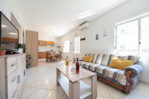 Kuchyň nebo kuchyňský kout v ubytování Apartment True Blue