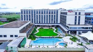 an aerial view of a hotel with a pool at Argyle Grand Hotel Nairobi Airport in Nairobi