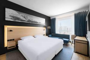 Postel nebo postele na pokoji v ubytování Park Inn by Radisson Makkah Thakher Alsharqi