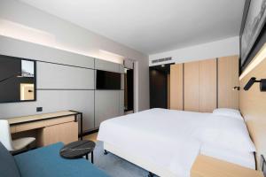 Postel nebo postele na pokoji v ubytování Park Inn by Radisson Makkah Thakher Alsharqi