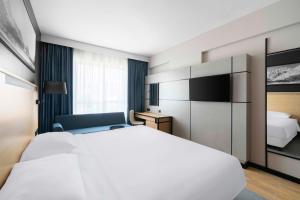 Postel nebo postele na pokoji v ubytování Park Inn by Radisson Makkah Thakher Alsharqi