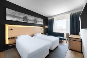 Postel nebo postele na pokoji v ubytování Park Inn by Radisson Makkah Thakher Alsharqi