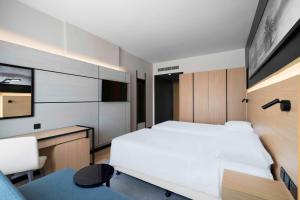 Postel nebo postele na pokoji v ubytování Park Inn by Radisson Makkah Thakher Alsharqi