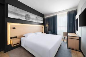 Postel nebo postele na pokoji v ubytování Park Inn by Radisson Makkah Thakher Alsharqi