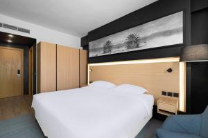 Postel nebo postele na pokoji v ubytování Park Inn by Radisson Makkah Thakher Alsharqi