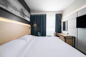 Postel nebo postele na pokoji v ubytování Park Inn by Radisson Makkah Thakher Alsharqi