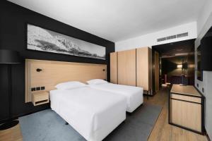 Postel nebo postele na pokoji v ubytování Park Inn by Radisson Makkah Thakher Alsharqi