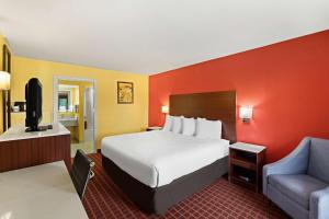 Postel nebo postele na pokoji v ubytování SureStay by Best Western Gulfport